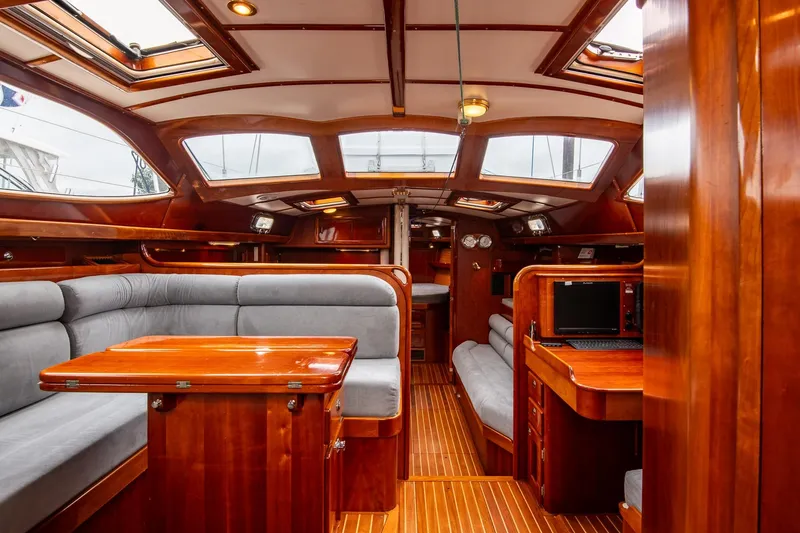 Slide: The Image of Luxurious 2007 Morris Ocean Series 45 yacht interior with wood finish and plush seating. - 32