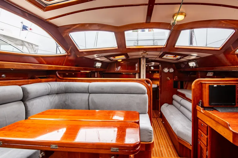Slide: The Image of Luxurious 2007 Morris Ocean Series 45 yacht interior with elegant wood finish and plush seating. - 33
