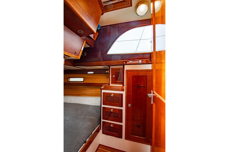 Slide: The Image of Luxurious wooden interior of 2007 Morris Ocean Series 45 yacht cabin. - 34
