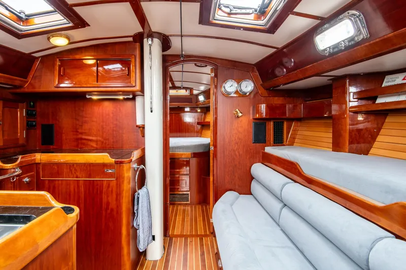 Slide: The Image of Luxurious 2007 Morris Ocean Series 45 yacht interior with polished wood and cozy seating. - 38