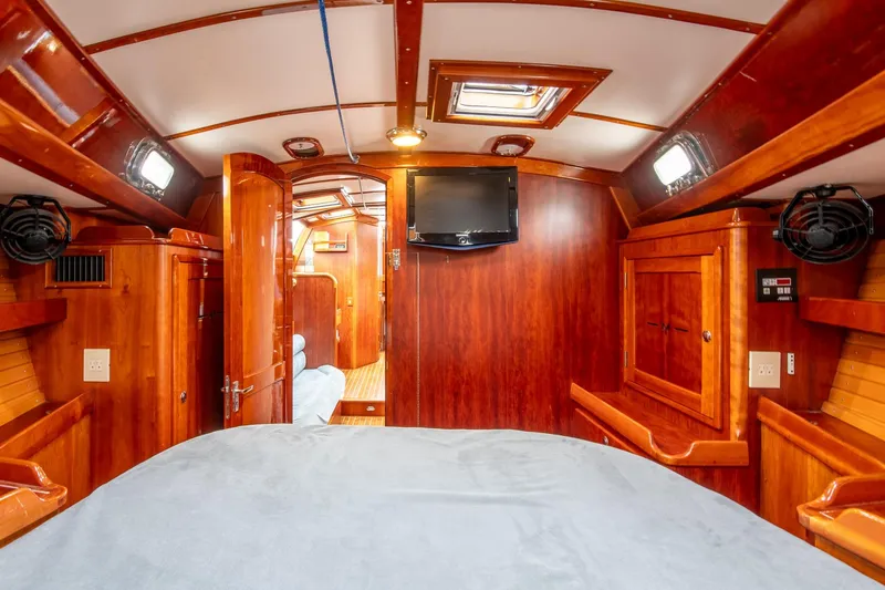 Slide: The Image of Luxurious 2007 Morris Ocean Series 45 yacht interior with rich wood finish and modern amenities. - 48
