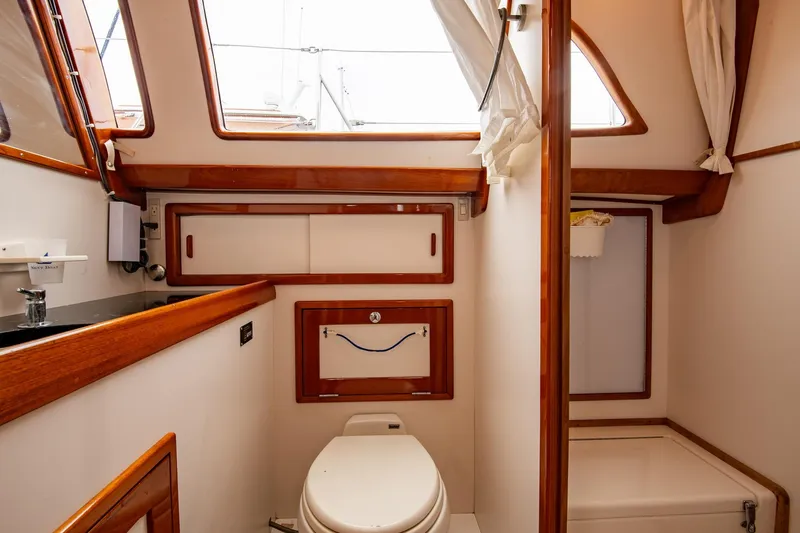 Slide: The Image of Luxurious bathroom interior of 2007 Morris Ocean Series 45 yacht with wooden accents. - 49