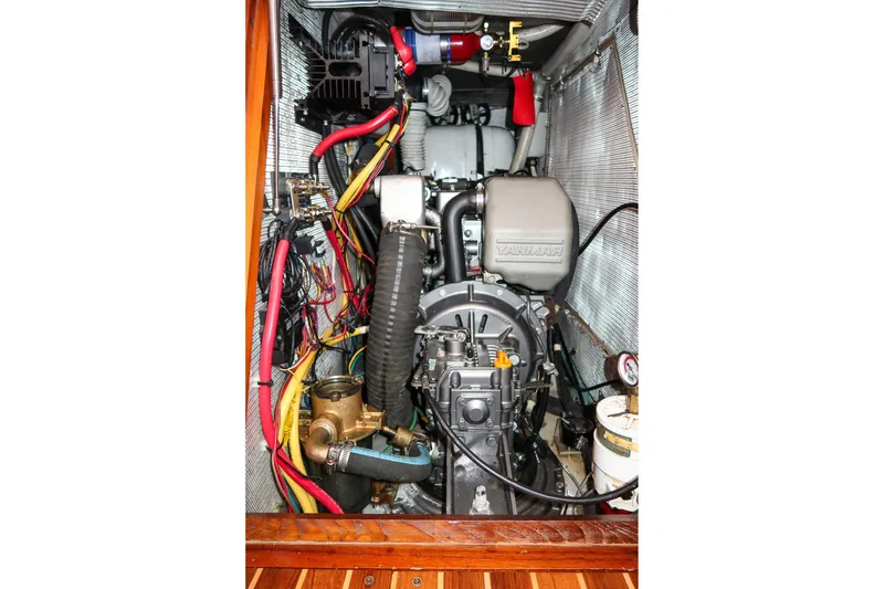 Slide: The Image of Engine compartment of a 2007 Morris Ocean Series 45 sailboat, featuring a Yanmar engine. - 53