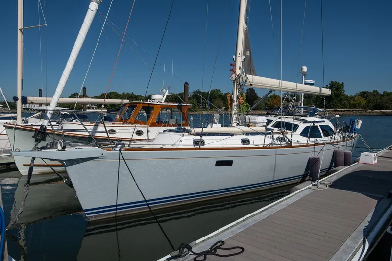Slide: The Image of 2007 Morris Ocean Series 45 sailboat docked at marina under clear blue sky. - 9