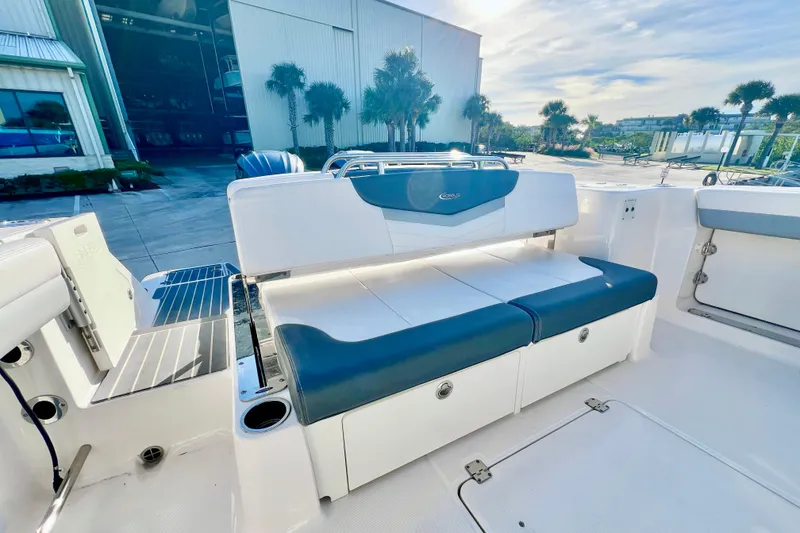 Slide: The Image of 2021 Robalo R317 Dual Console boat interior with spacious seating and modern design. - 12