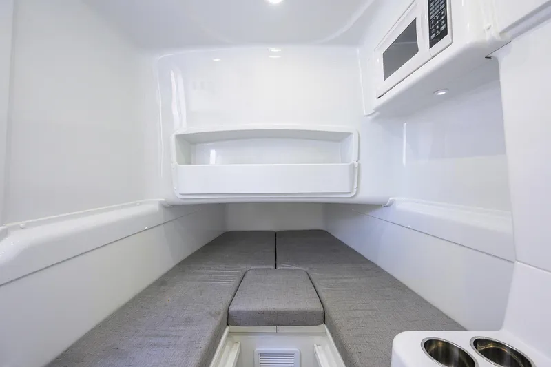 Slide: The Image of Interior cabin of 2021 Yellowfin 42 boat with modern amenities and seating. - 46