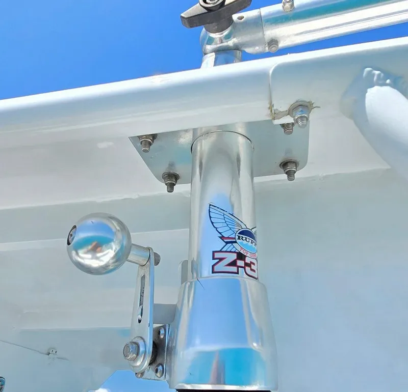 Slide: The Image of Close-up of a 2012 Contender Custom 33 Center Console boat's metal component. - 17