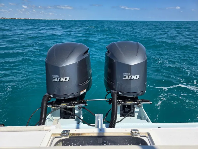 Slide: The Image of Twin Yamaha 300 engines on a 2012 Contender Custom 33 Center Console boat. - 27