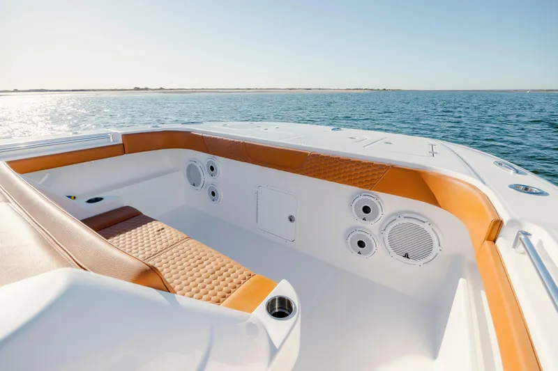 Slide: The Image of Luxurious seating area on 2024 Invincible 46 Pilothouse boat, with ocean view. - 32