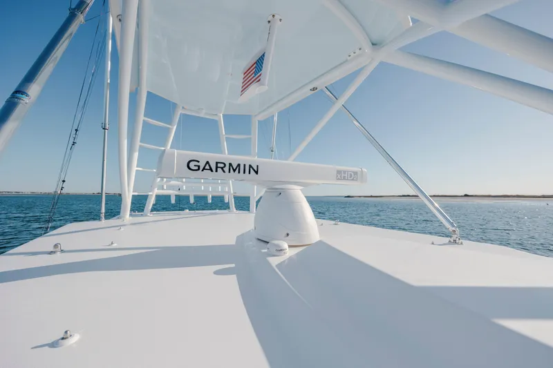 Slide: The Image of 2024 Invincible 46 Pilothouse with Garmin radar on open sea. - 41