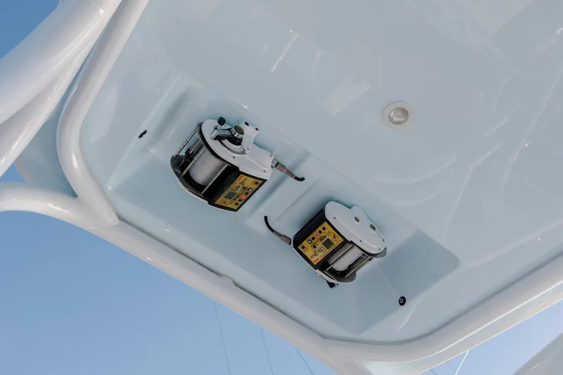 Slide: The Image of 2024 Invincible 46 Pilothouse boat ceiling with mounted equipment. - 49