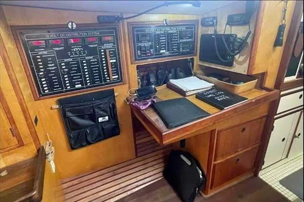 Slide: The Image of Control panel and workspace inside a 1992 Bruce Bingham Custom 47 Steel Hull yacht. - 15