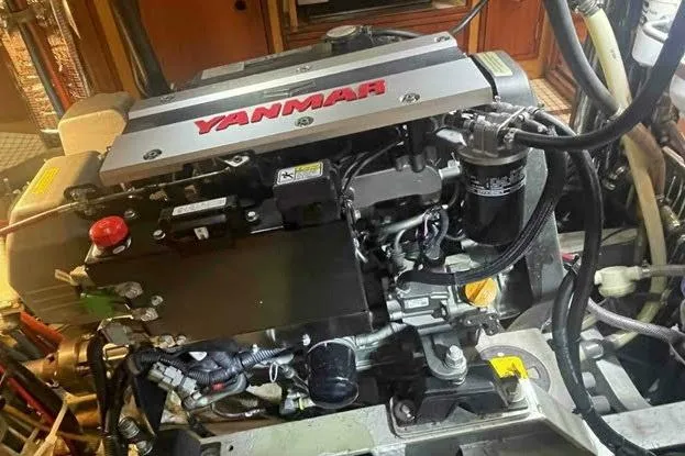 Slide: The Image of Engine of 1992 Bruce Bingham Custom 47 Steel Hull, featuring Yanmar components. - 19