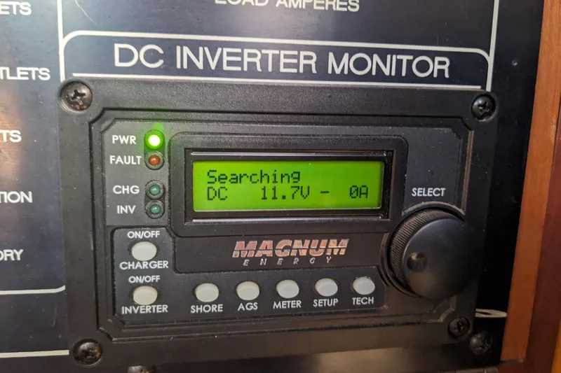 Slide: The Image of DC inverter monitor on Bruce Bingham Custom 47, displaying 11.7V, 0A. - 20