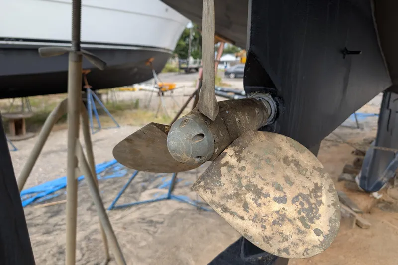 Slide: The Image of Propeller of 1992 Bruce Bingham Custom 47 Steel Hull, dry docked for maintenance. - 30