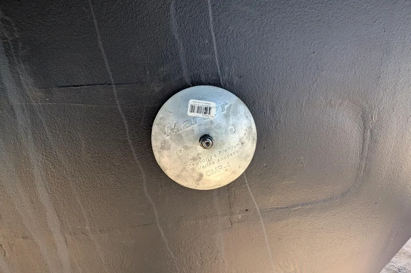 Slide: The Image of Steel hull of 1992 Bruce Bingham Custom 47 with marine anode attached. - 33