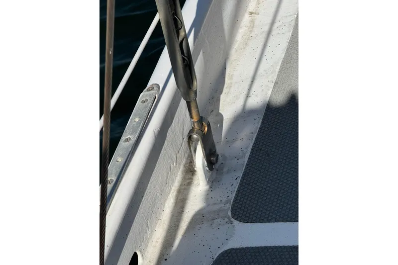 Slide: The Image of Close-up of deck hardware on 1992 Bruce Bingham Custom Steel Hull 47 sailboat. - 47