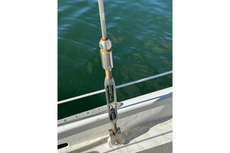 Slide: The Image of Close-up of rigging on 1992 Bruce Bingham Custom Steel Hull 47 sailboat. - 49