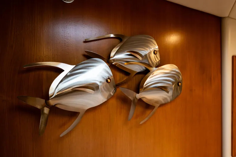 Slide: The Image of Metal fish wall art on Riviera 37 Flybridge yacht, 2004 model. - 12