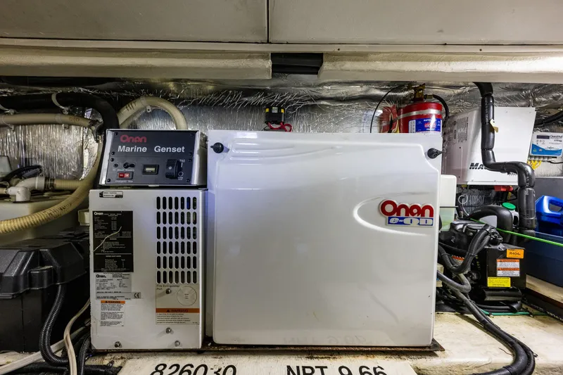 Slide: The Image of Onan marine generator in 2004 Riviera 37 Flybridge engine room. - 28