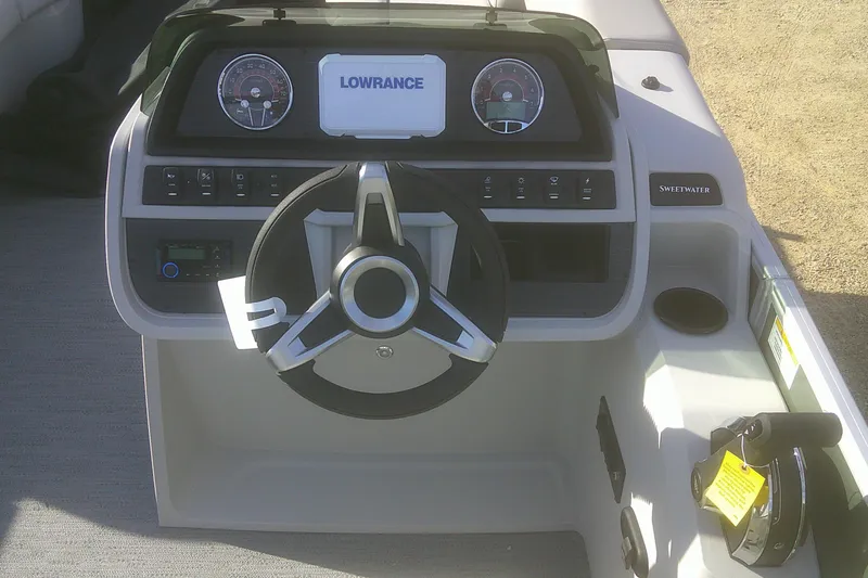 Slide: The Image of Steering console of 2026 Godfrey Sweetwater 2286 FS boat with Lowrance display. - 6