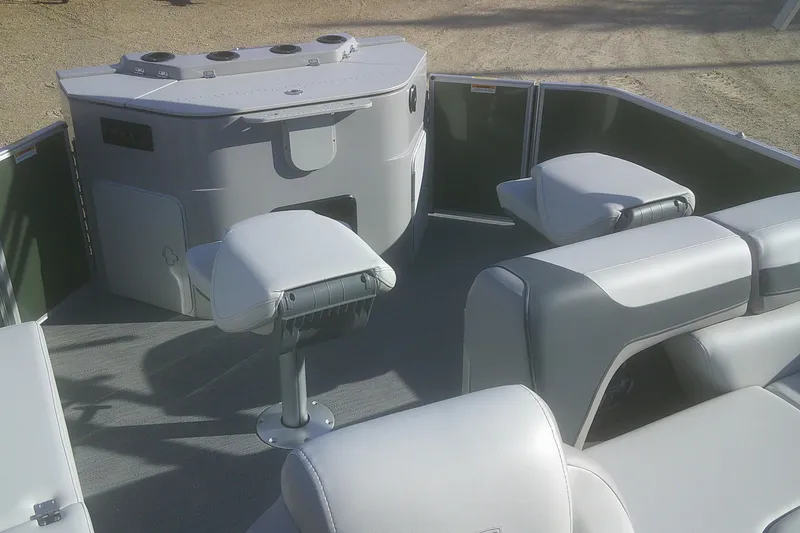 Slide: The Image of 2026 Godfrey Sweetwater 2286 FS pontoon boat interior with seating and console. - 8