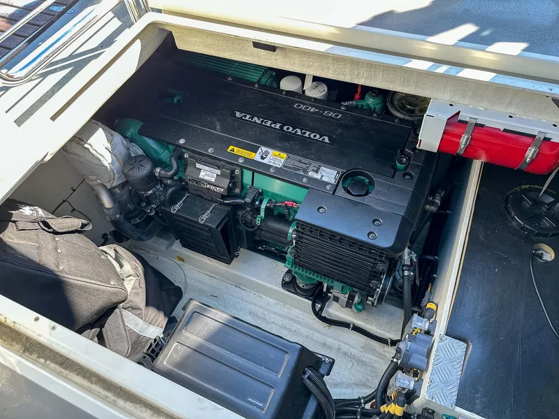 Slide: The Image of Engine compartment of a 2019 Targa 32 boat featuring a Volvo Penta engine. - 12