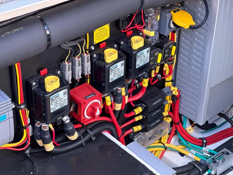 Slide: The Image of Electrical system of a 2019 Targa 32 boat, featuring circuit breakers and wiring. - 15