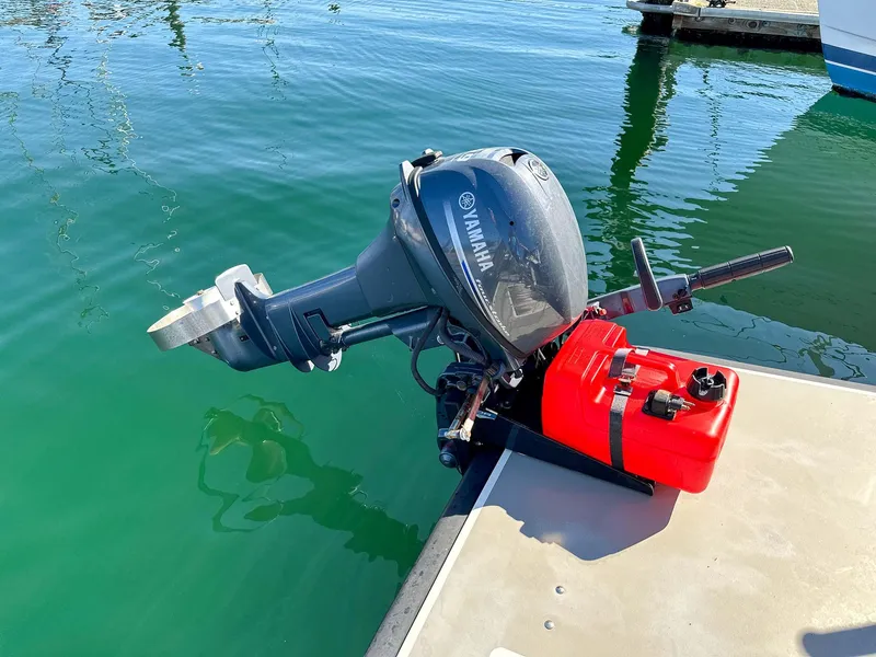 Slide: The Image of Yamaha outboard motor on dock, adjacent to Targa 32 boat, 2019 model. - 8
