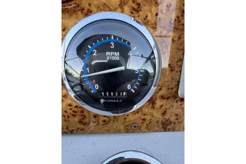 Slide: The Image of Tachometer of 2007 Formula 310 Sun Sport boat, displaying RPM readings. - 13
