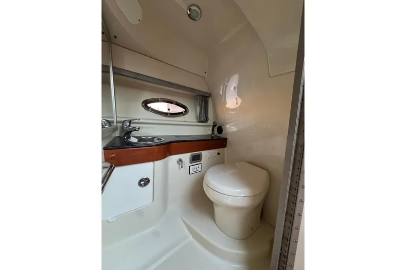 Slide: The Image of 2007 Formula 310 Sun Sport boat bathroom with sink and toilet. - 23