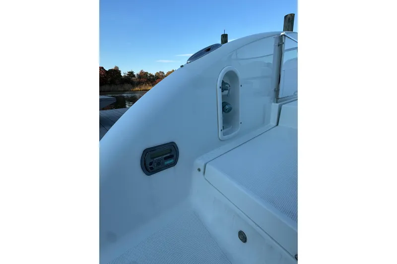 Slide: The Image of 2007 Formula 310 Sun Sport boat deck with control panel and seating area. - 5