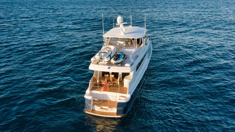 Slide: The Image of 2002 Hatteras Motor Yacht cruising on open sea, aerial view. - 9
