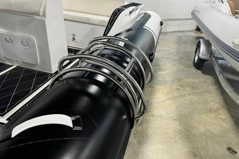 Slide: The Image of 2023 Aquaform 200 AF boat detail, featuring sleek design and stainless steel railings. - 5