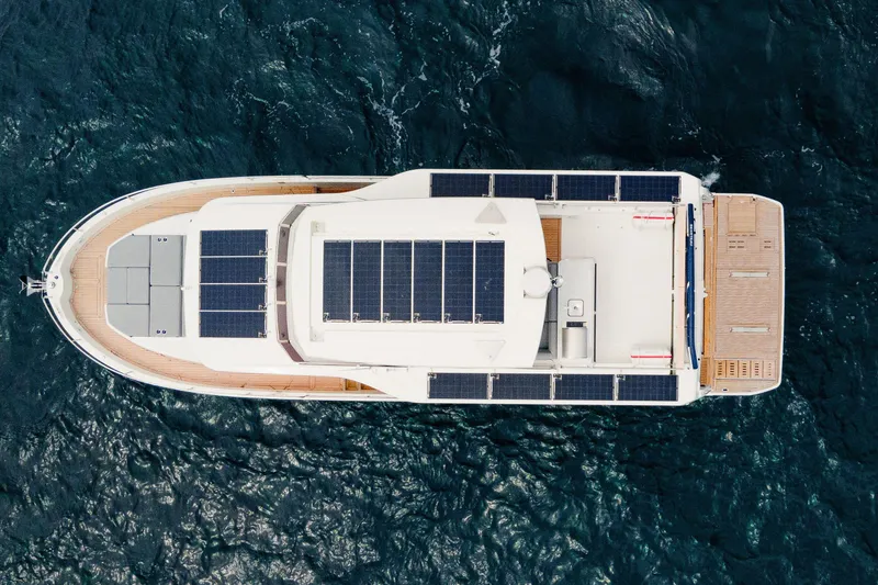 Slide: The Image of Top view of 2026 Beneteau Swift Trawler 54 with solar panels on deck. - 6
