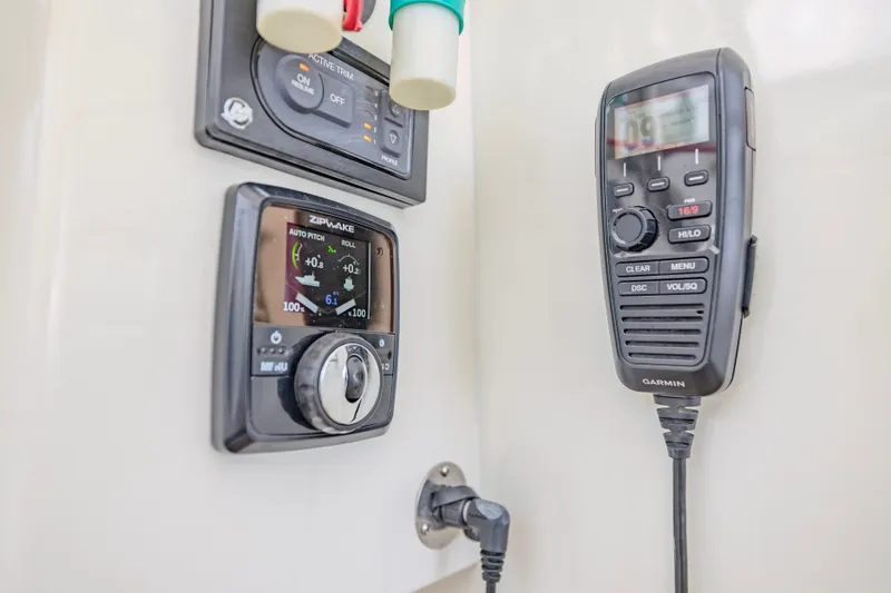 Slide: The Image of Control panel and radio on 2021 Brooklin Boat Yard 32 Express. - 16