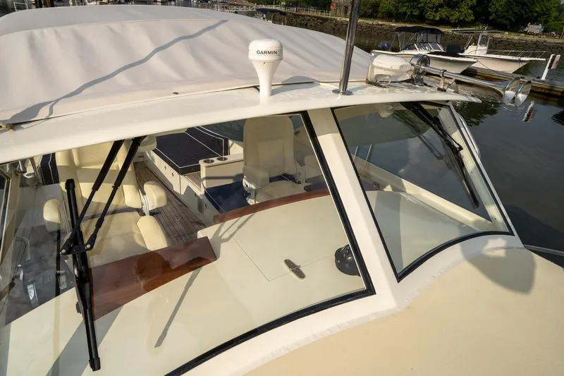 Slide: The Image of 2021 Brooklin Boat Yard 32 Express with sleek design, docked at marina. - 14