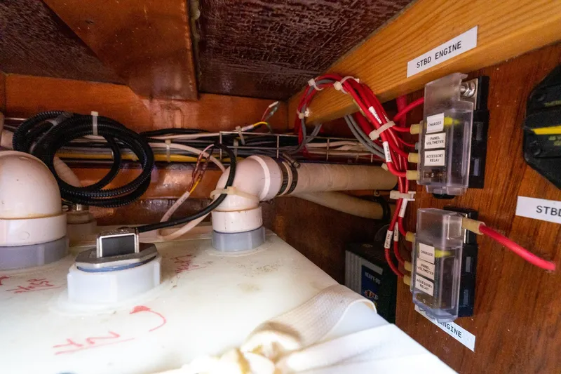Slide: The Image of Electrical wiring and components inside a 2021 Brooklin Boat Yard 32 Express. - 40