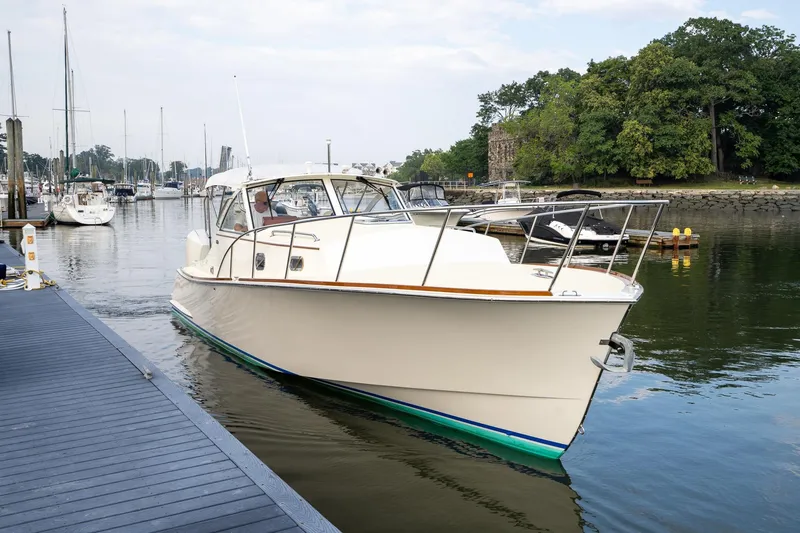 Slide: The Image of 2021 Brooklin Boat Yard 32 Express cruising near marina dock. - 42