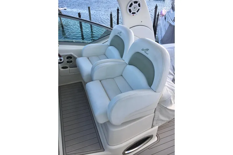 Slide: The Image of Luxury seating on 2007 Sea Ray 340 Sundancer boat, overlooking water. - 11