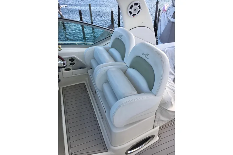 Slide: The Image of Luxury seating on 2007 Sea Ray 340 Sundancer boat, dockside view. - 12