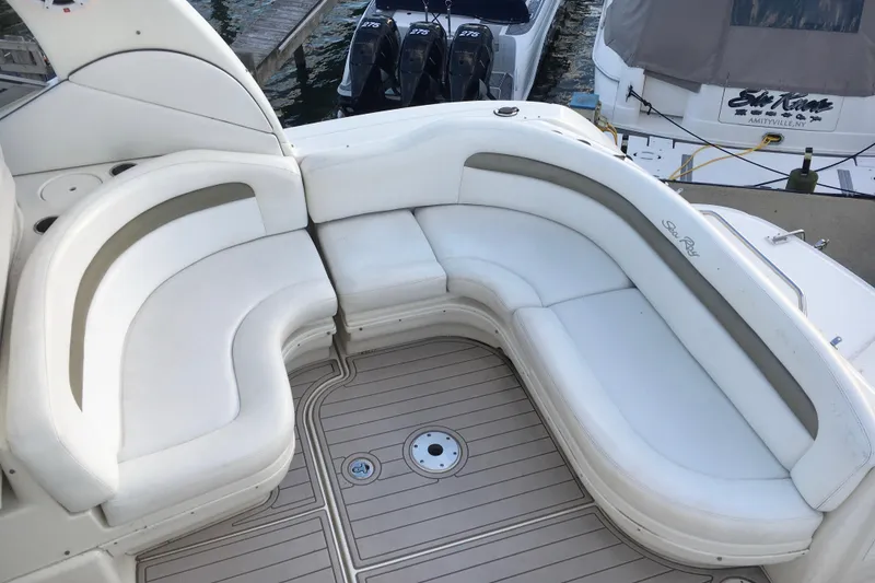 Slide: The Image of Luxurious seating on 2007 Sea Ray 340 Sundancer yacht, featuring elegant white upholstery. - 17