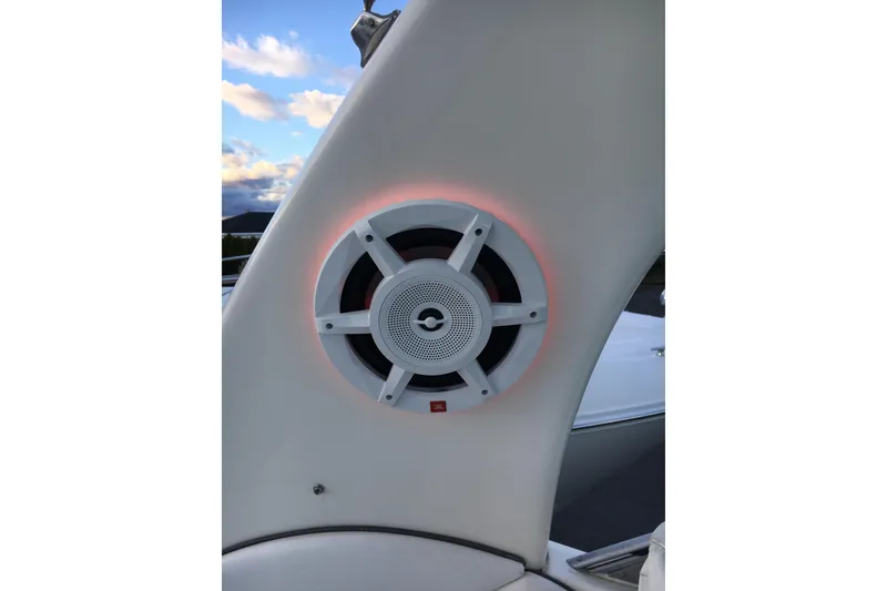 Slide: The Image of Speaker on 2007 Sea Ray 340 Sundancer boat, illuminated against a blue sky. - 18