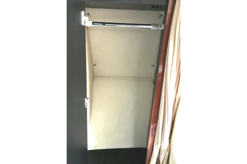 Slide: The Image of 2007 Sea Ray 340 Sundancer interior closet with hanging rod. - 21