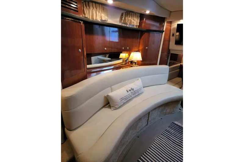 Slide: The Image of Luxurious interior of 2007 Sea Ray 340 Sundancer with elegant seating and warm lighting. - 24