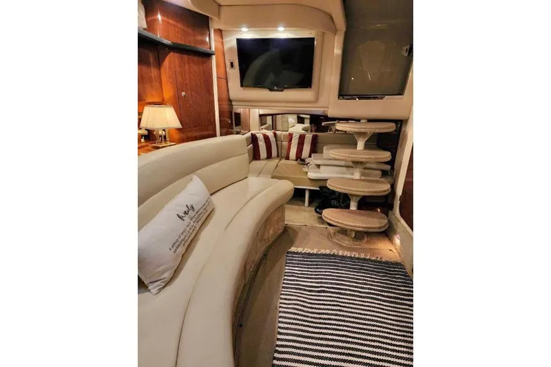 Slide: The Image of Luxurious interior of 2007 Sea Ray 340 Sundancer yacht with plush seating and elegant decor. - 25