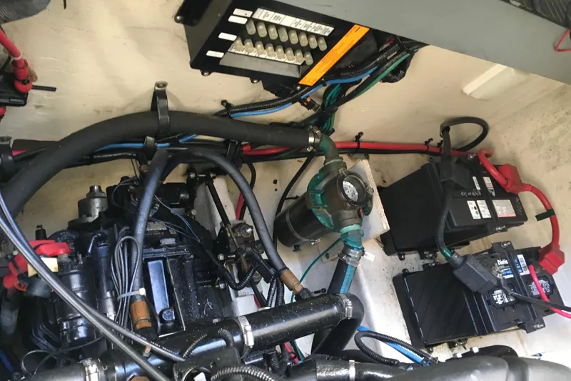 Slide: The Image of Engine compartment of 2007 Sea Ray 340 Sundancer with visible wiring and components. - 31