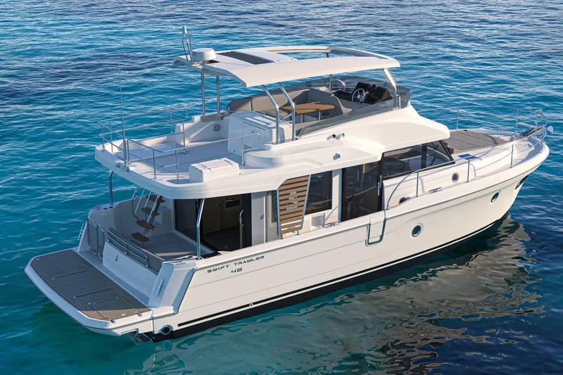 Slide: The Image of 2026 Beneteau Swift Trawler 48 on calm blue water, showcasing sleek design and spacious deck. - 22