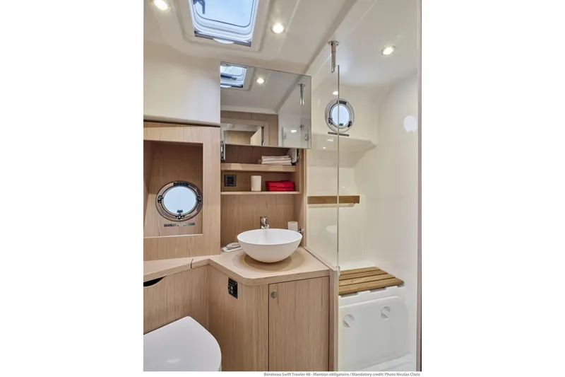 Slide: The Image of Modern bathroom interior of 2026 Beneteau Swift Trawler 48, featuring sleek design and natural lighting. - 24