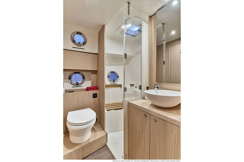 Slide: The Image of Luxurious bathroom in 2026 Beneteau Swift Trawler 48 with modern fixtures and elegant design. - 34